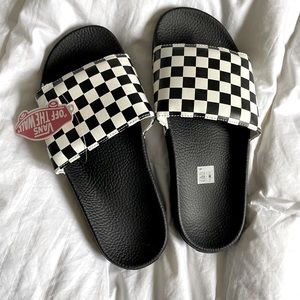 VANS checkerboard slides. Men’s 8. Women’s 9.5.